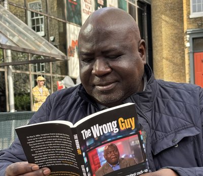 Guy Goma reading The Wrong Guy